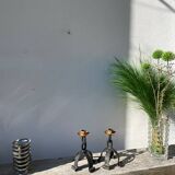 Pair of candlesticks with wrought iron chain