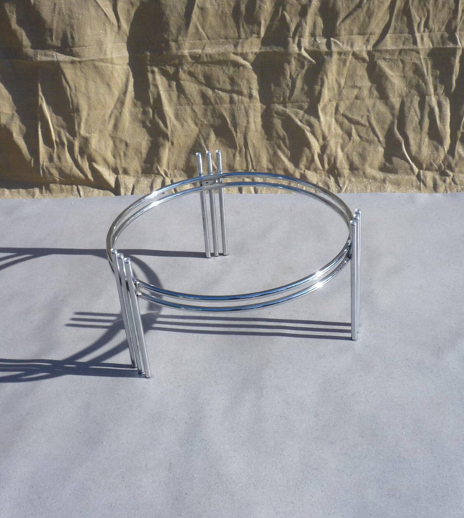 Chrome and glass tripod coffee table