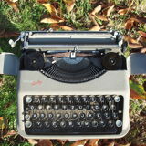 Hermes Baby typewriter with bag