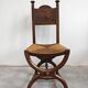 Pair of Neo-Renaissance oak chairs with straw seats, 1910