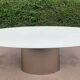 Oval designer dining table in frosted glass and brushed stainless steel