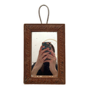 Antique mercury glass barber mirror and carved wooden frame