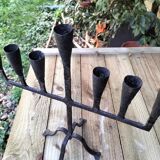 Brutalized wrought iron candle holder