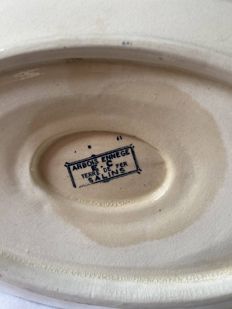 Sauceboat on a wrought iron base from Salins.