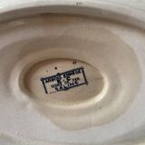 Sauceboat on a wrought iron base from Salins.