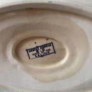 Sauceboat on a wrought iron base from Salins.