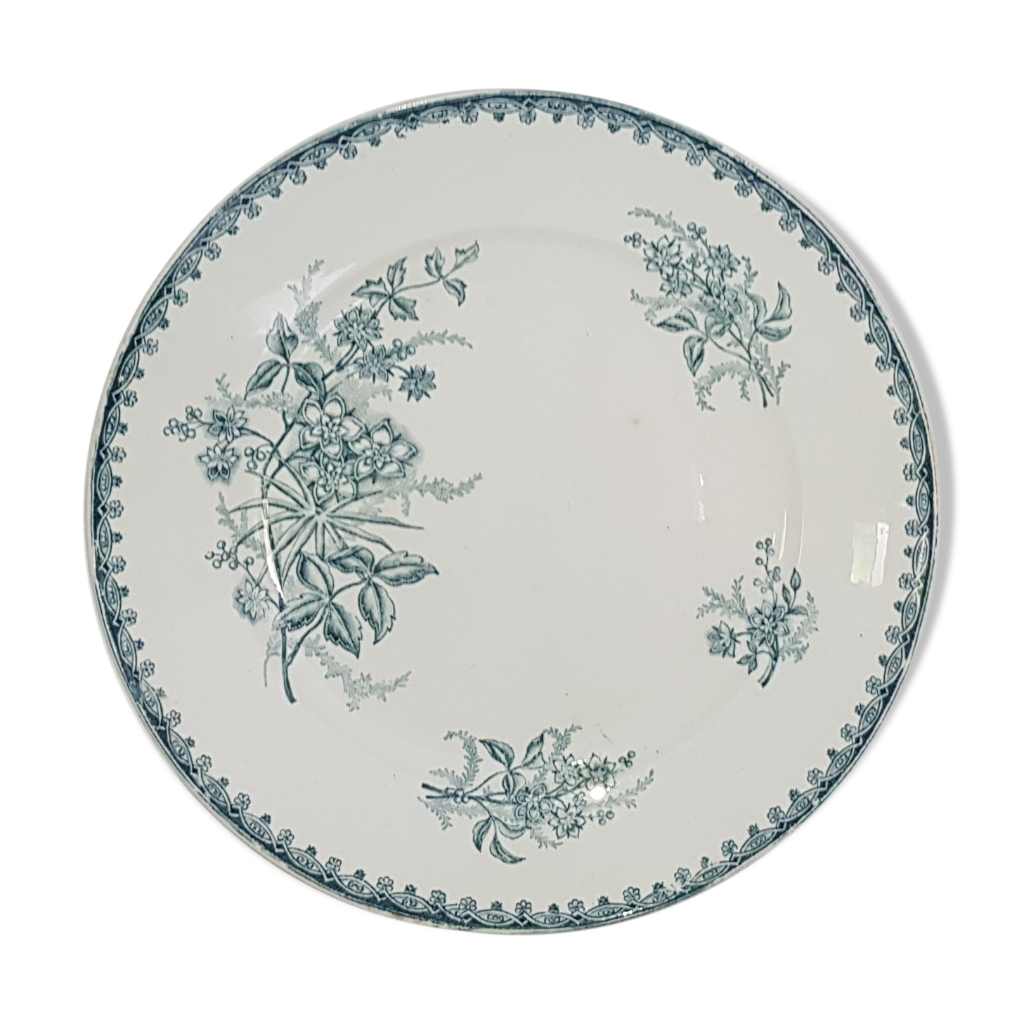 Round dish of service in earthenware Sté Amandinoise model Margot, iron earth.