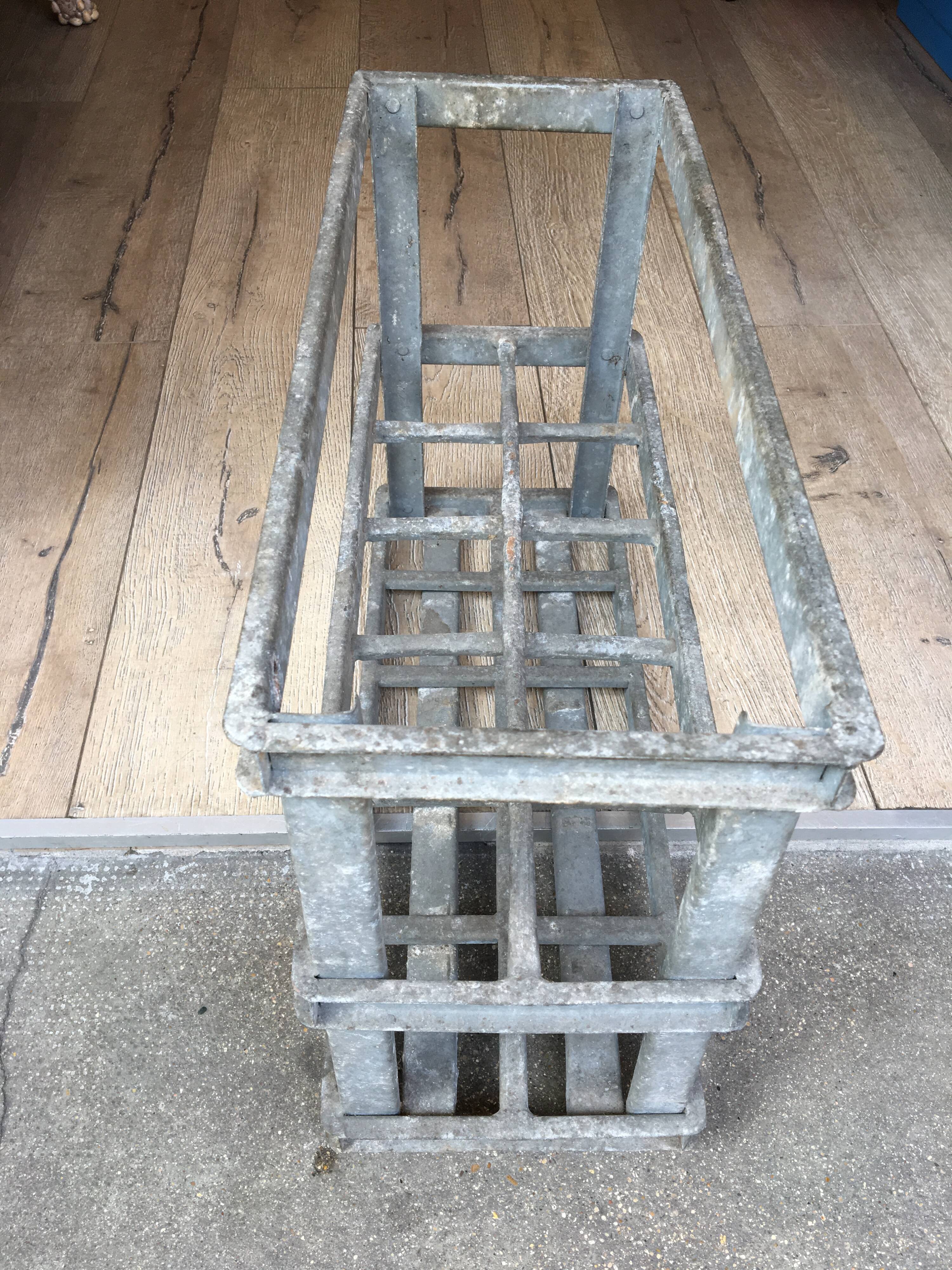 Old bottles in rectangular zinc locker