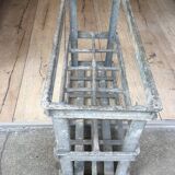 Old bottles in rectangular zinc locker