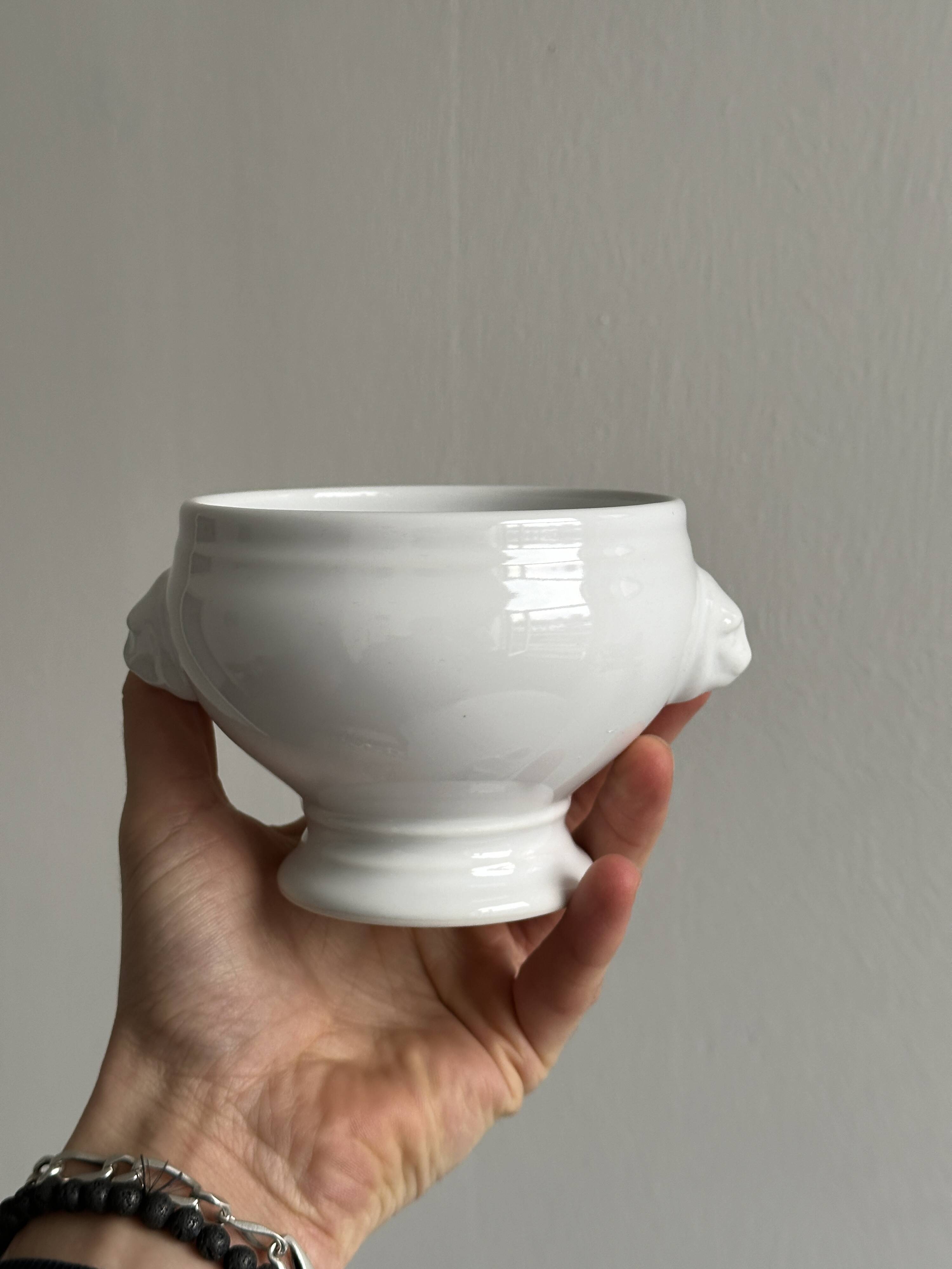 4 white porcelain bowls