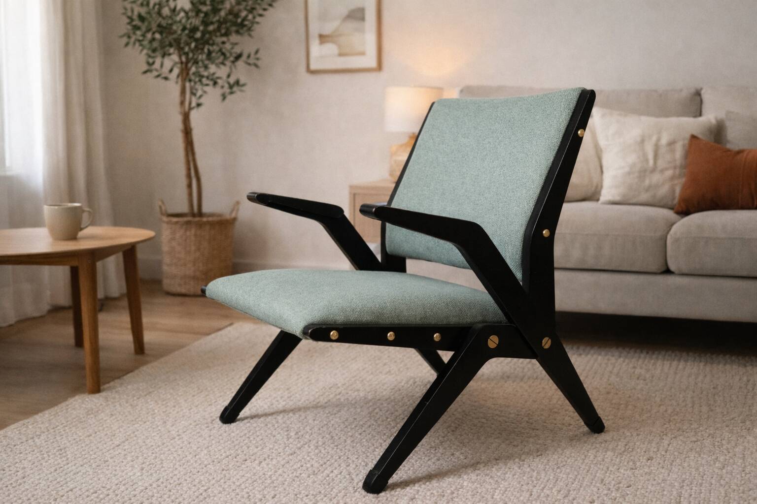 Vintage armchair from the 1960s in black wood and fabric.