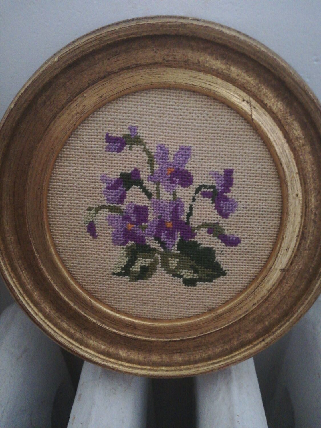 Pair of miniature gold round frames