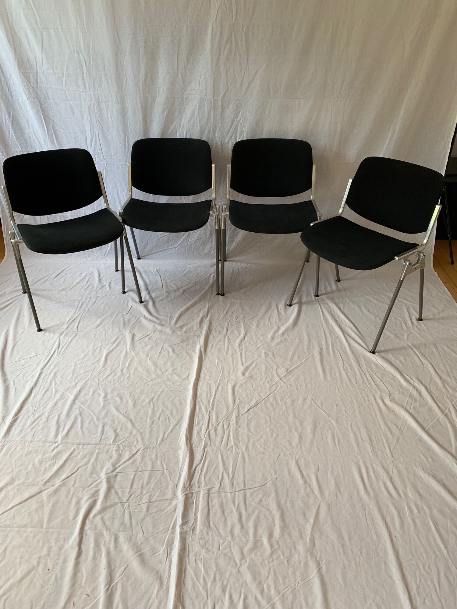A set of four Castelli DSC 106 chairs, designed by G. Piretti, Italy, 90s