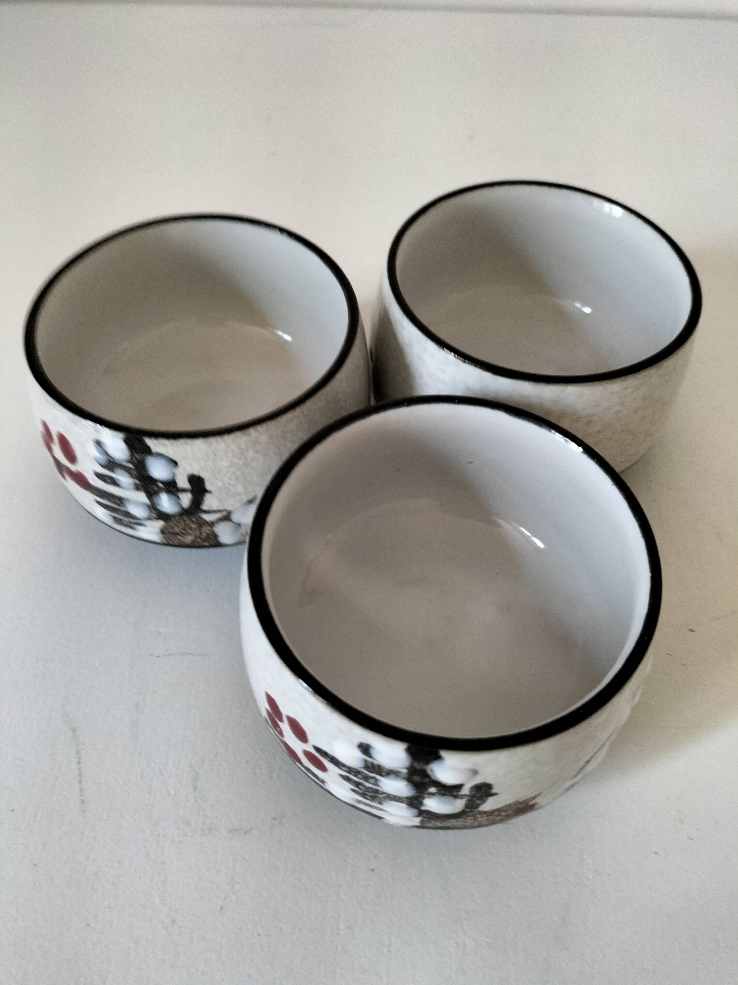 Three glazed ceramic bowls with raised graphic decoration, 1970s.