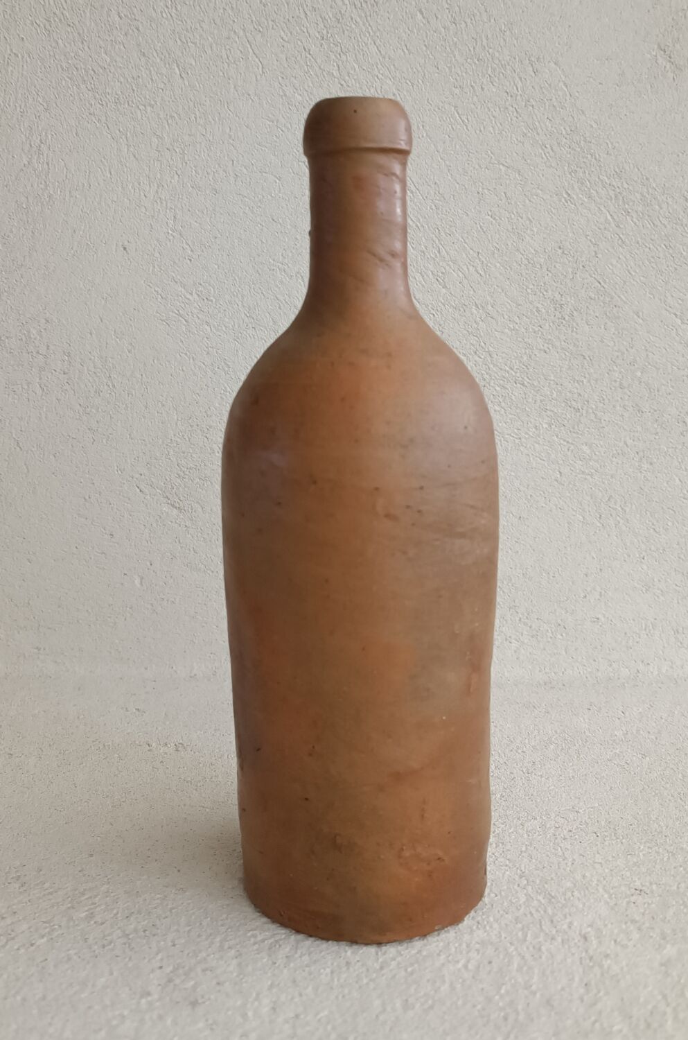 Antique terracotta bottle