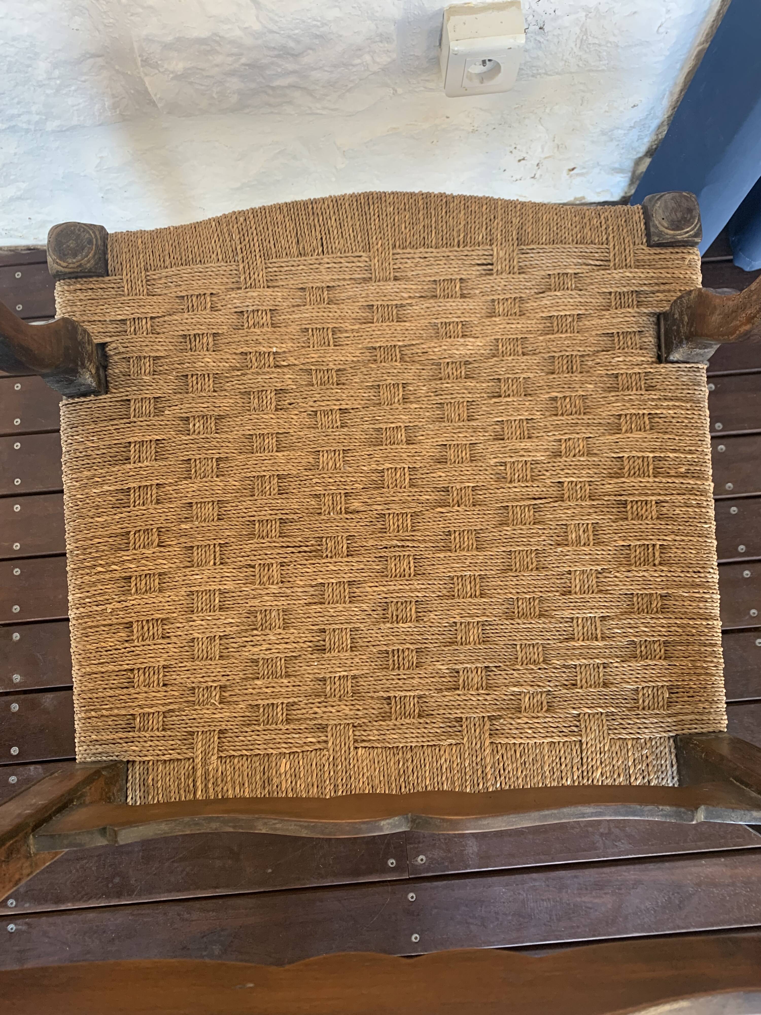 Pair of antique wooden armchairs with woven seats + cushions