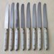 Set of 8 vintage table knives bakelite stainless steel and brass