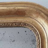 Old gilded mirror and old mercury glass - wall mirror with gold leaf