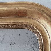 Old gilded mirror and old mercury glass - wall mirror with gold leaf