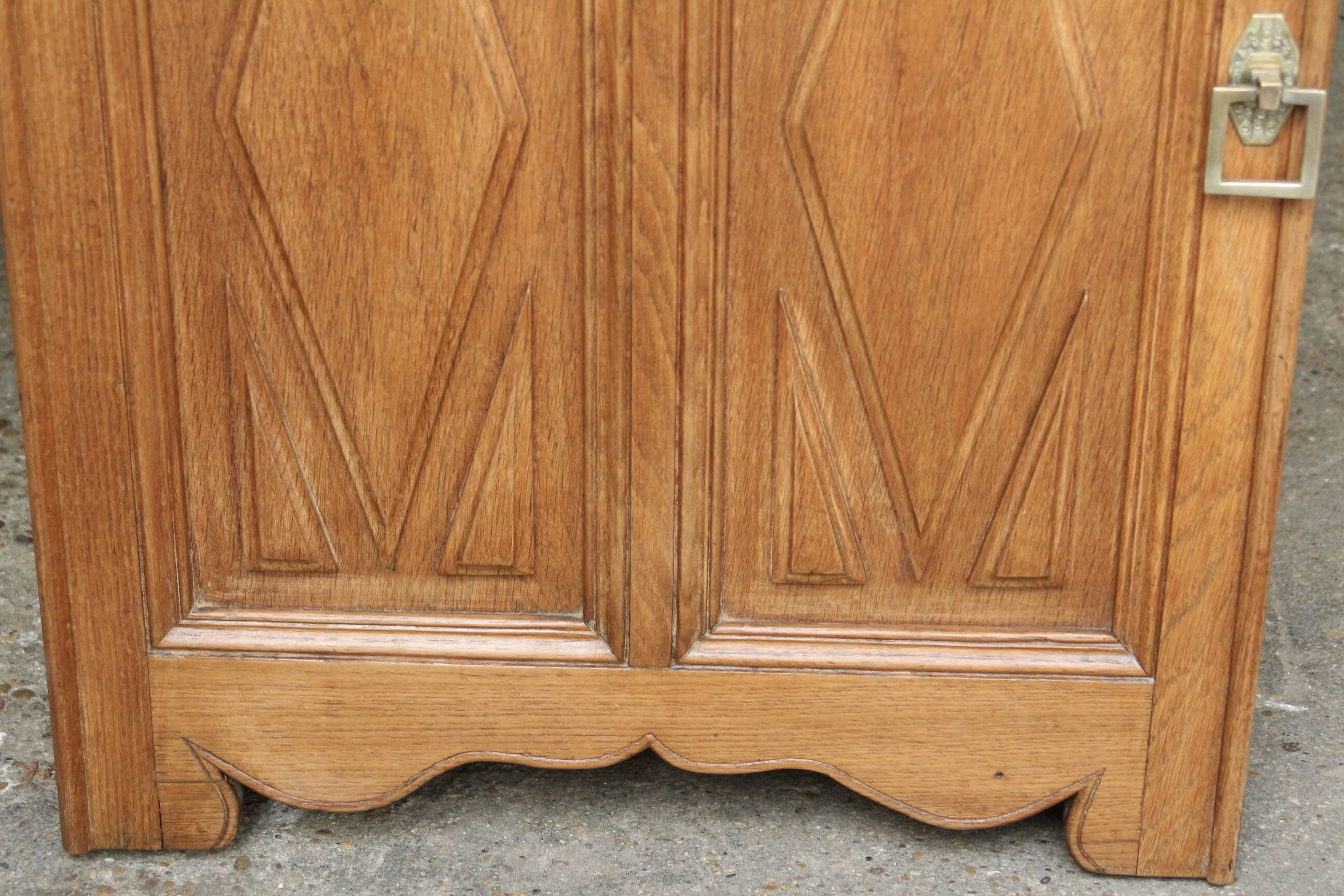 Art Deco jam cupboard in solid oak (circa 1930).