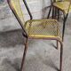 Six chaises en métal perforé seducta René Malaval