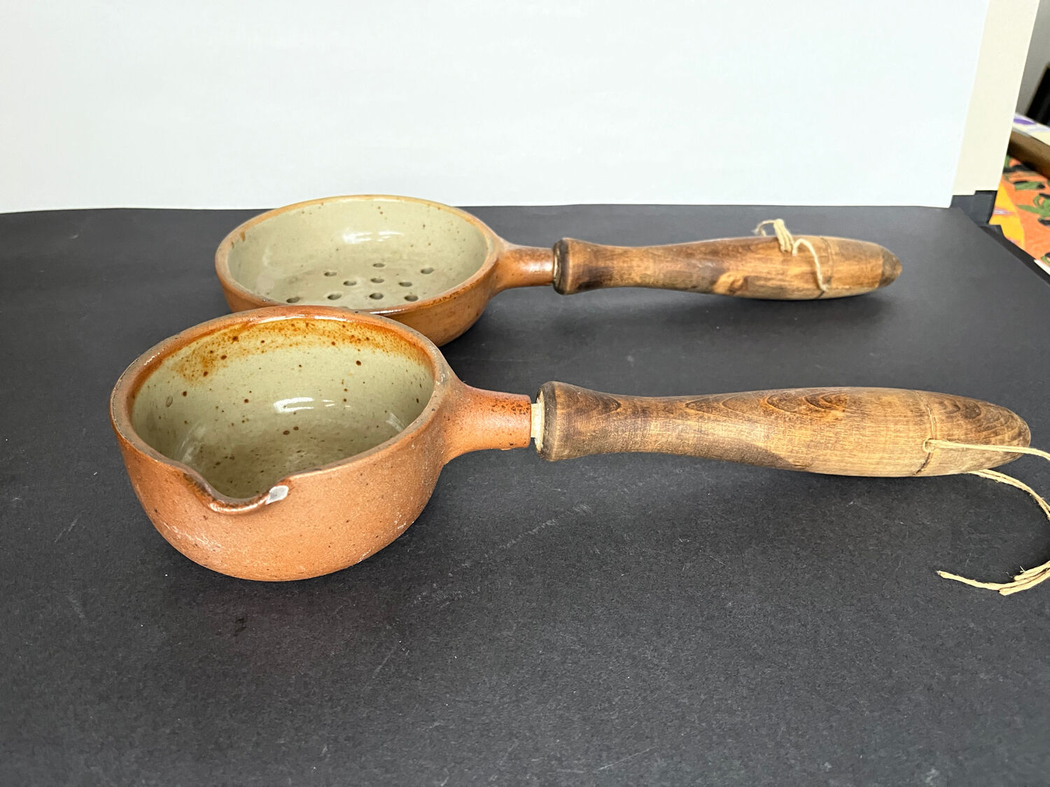 Ladle and sandstone strainer