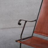 Pair of mid-century leather and metal folding armchairs