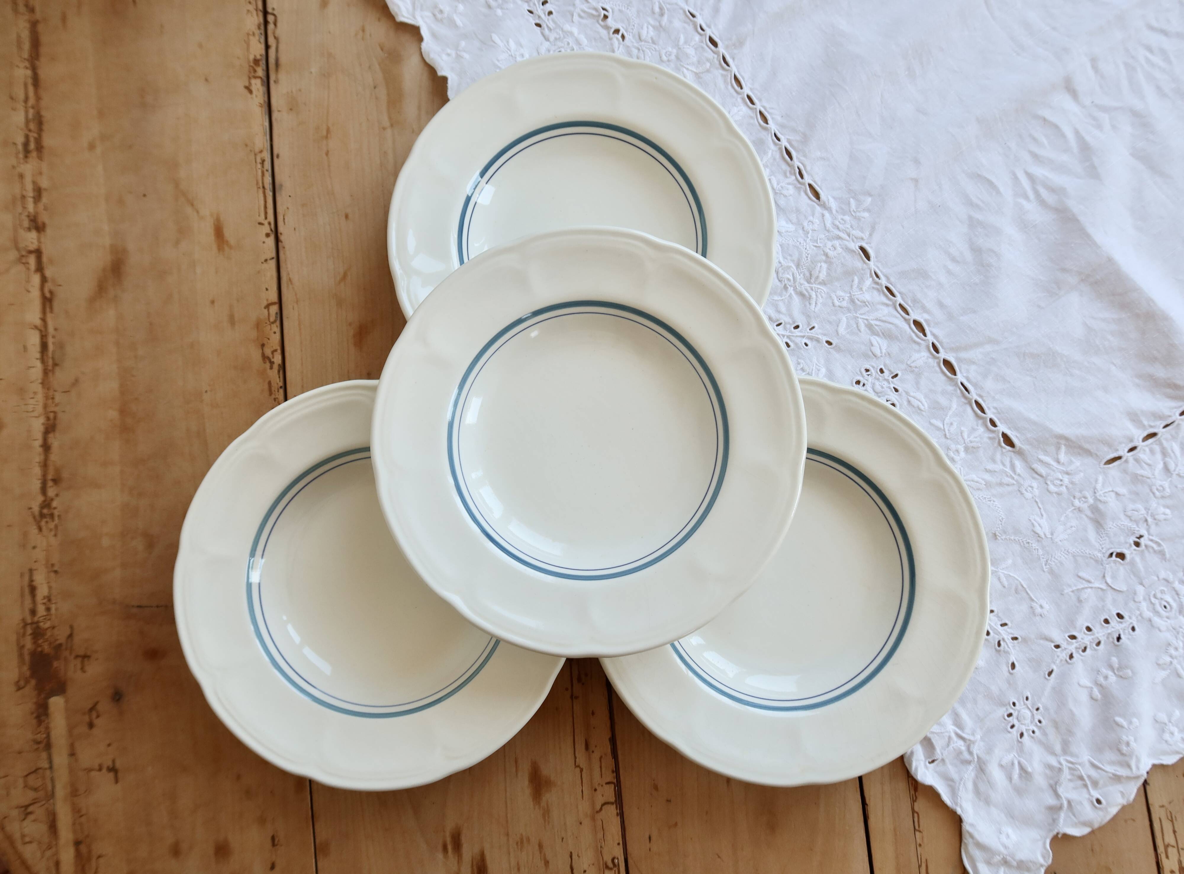 4 vintage ivory earthenware deep plates – double blue borders