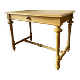 Desk table from the late 19th century, painted mustard, with turned stretcher.
