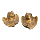 Pair of angel head wall sconces in gilded composition
