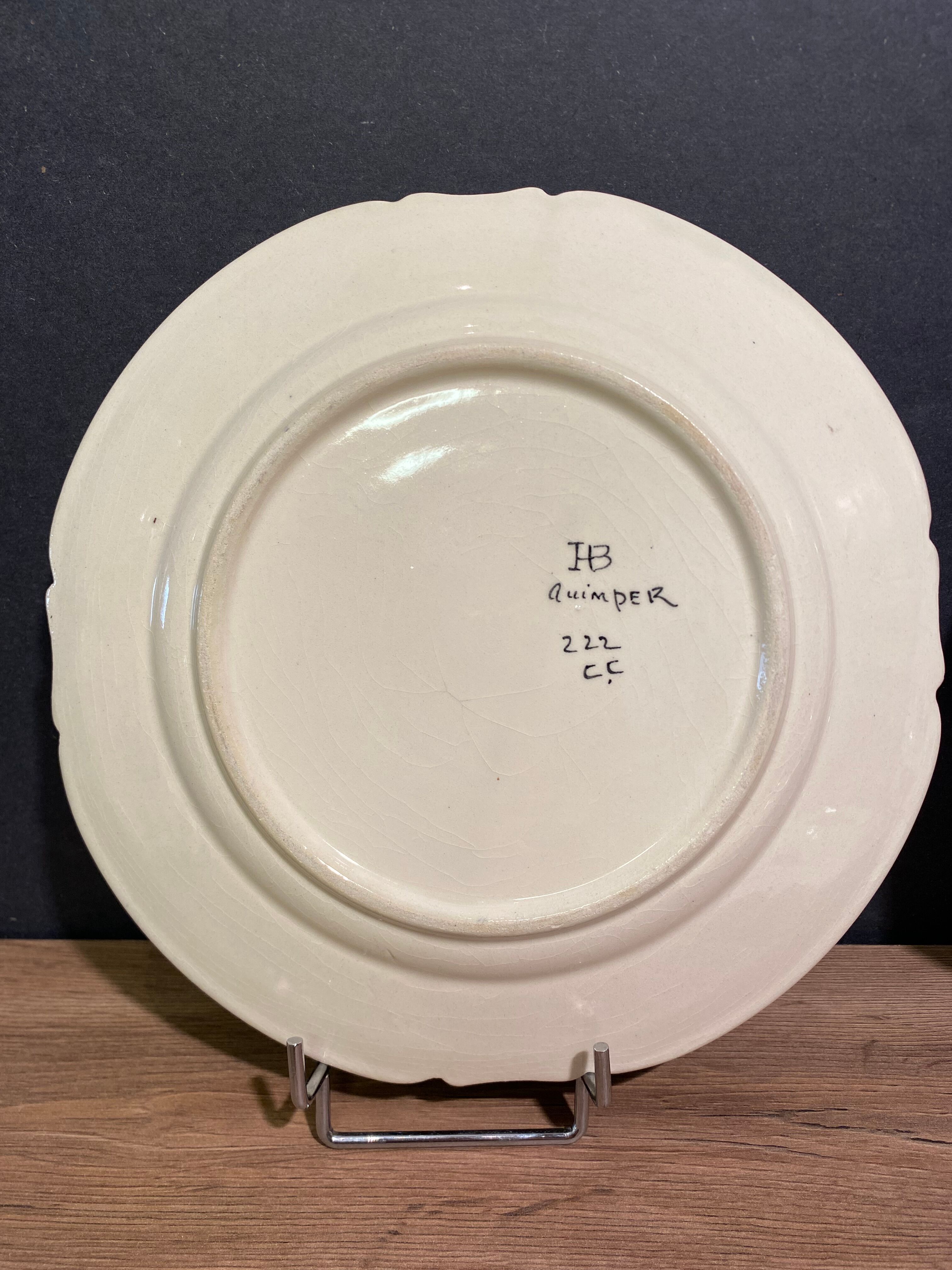 Six earthenware plates signed HB Quimper