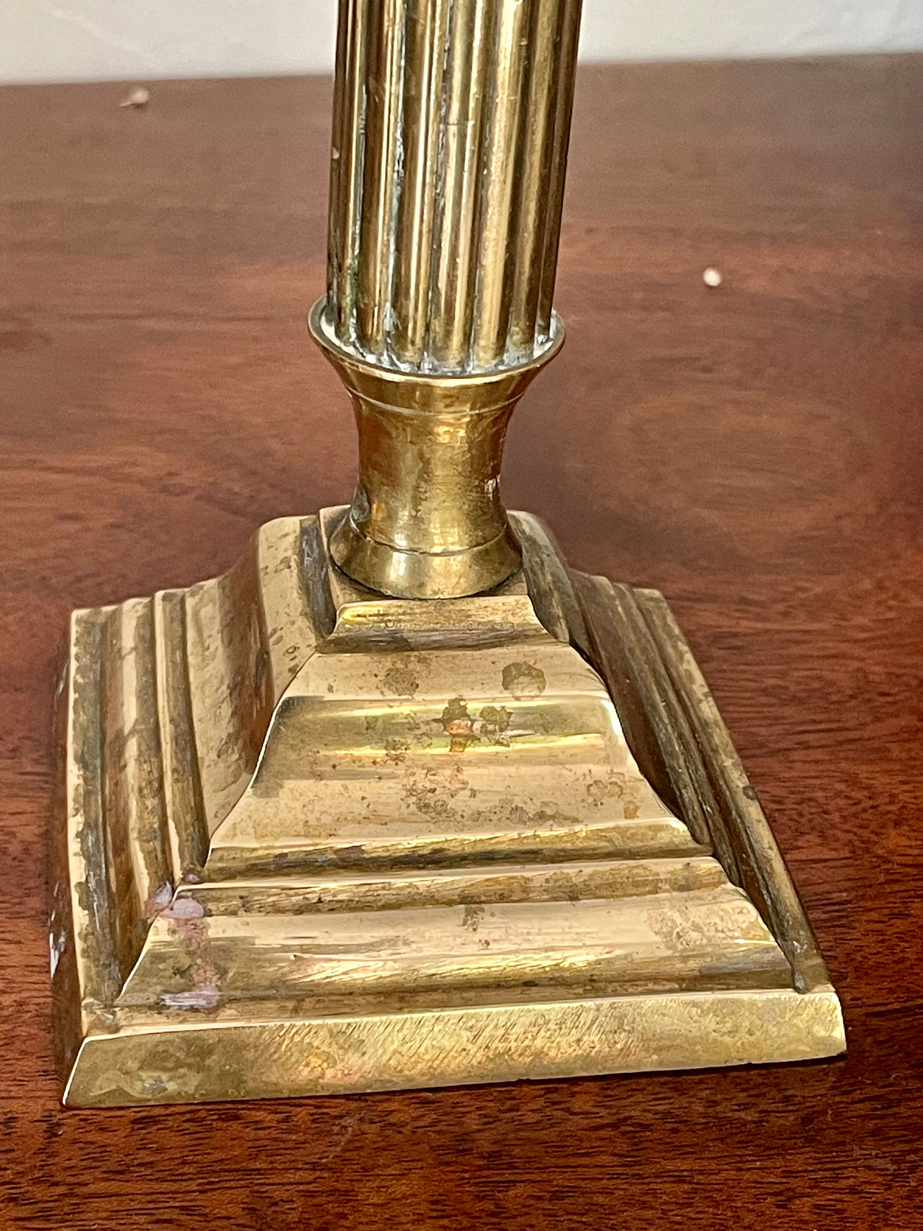 Payroll of brass column candle holders