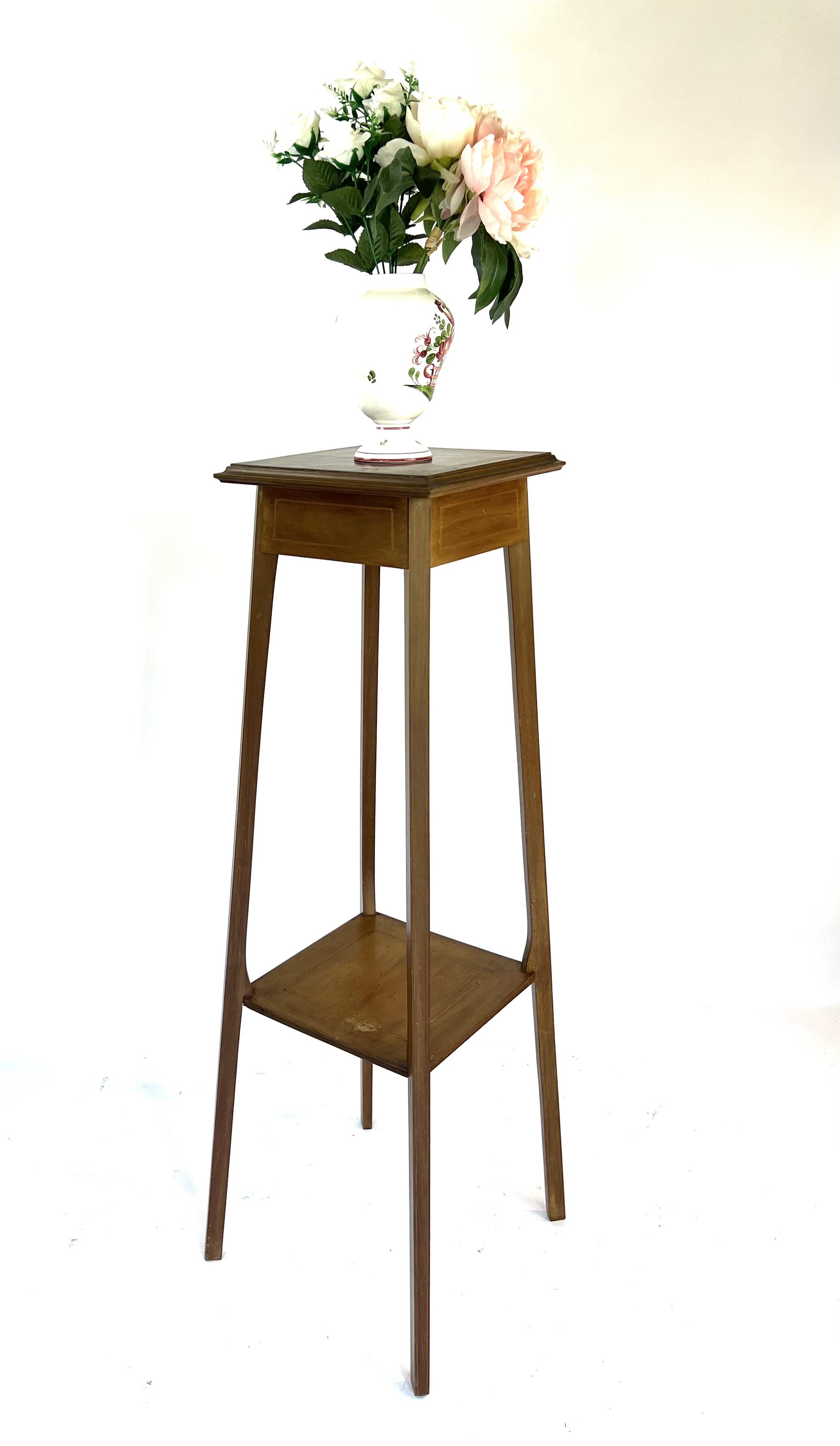 Large wooden pedestal table