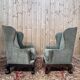 Pair of wingback armchairs in George III style – Carved wood – 18th century.