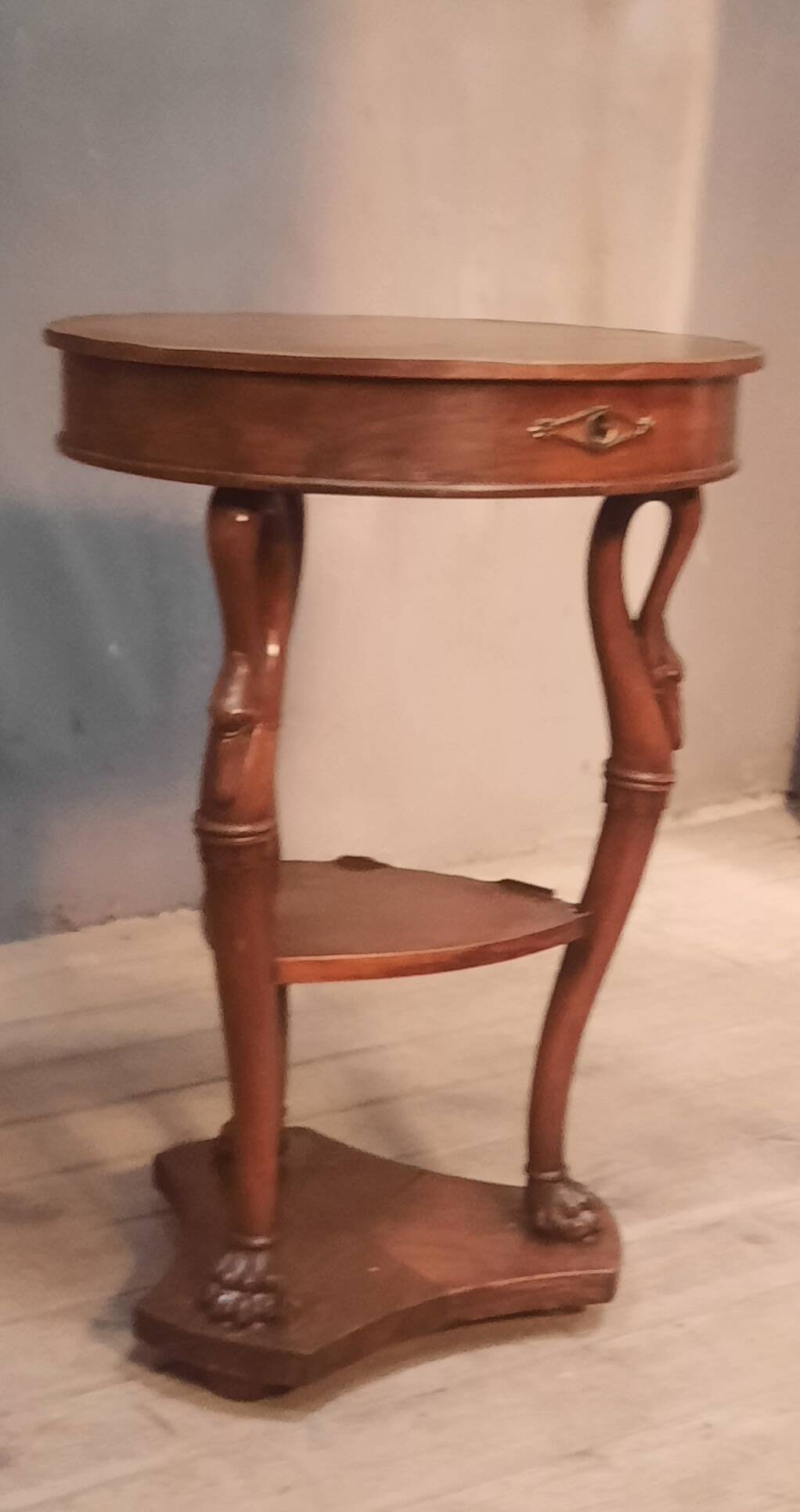 Side table with a swan neck.