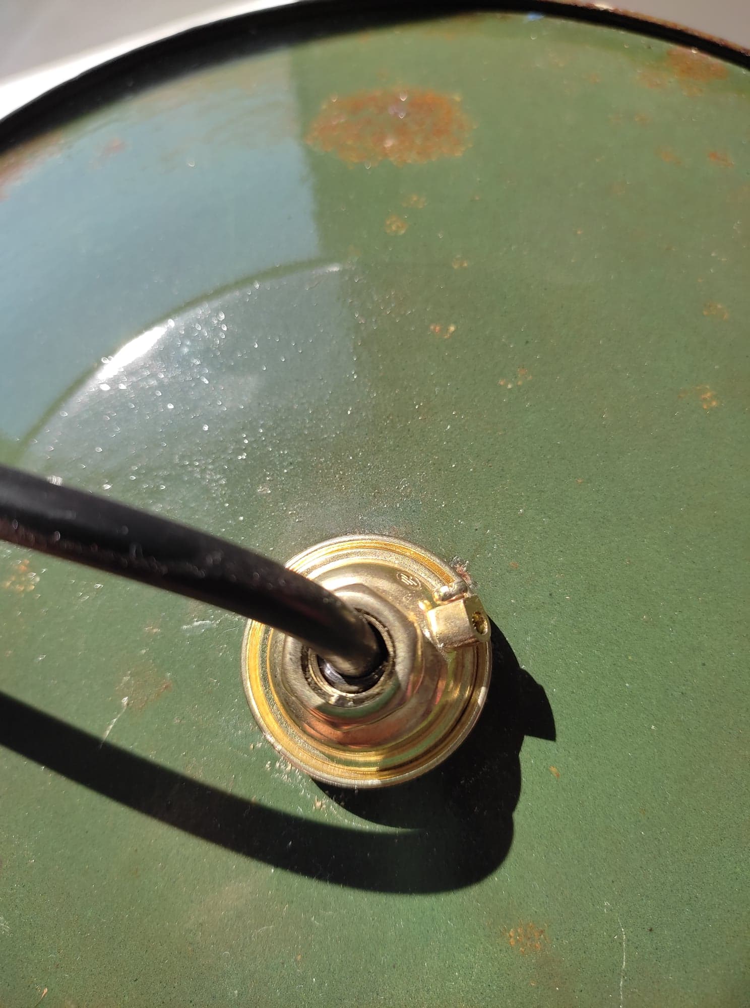 Old suspension in green enamelled sheet metal