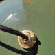 Old suspension in green enamelled sheet metal