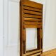 Two vintage wooden folding chairs, circa 1960