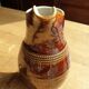 Berry's Berry pussity pitcher Booted medieval artcraft
