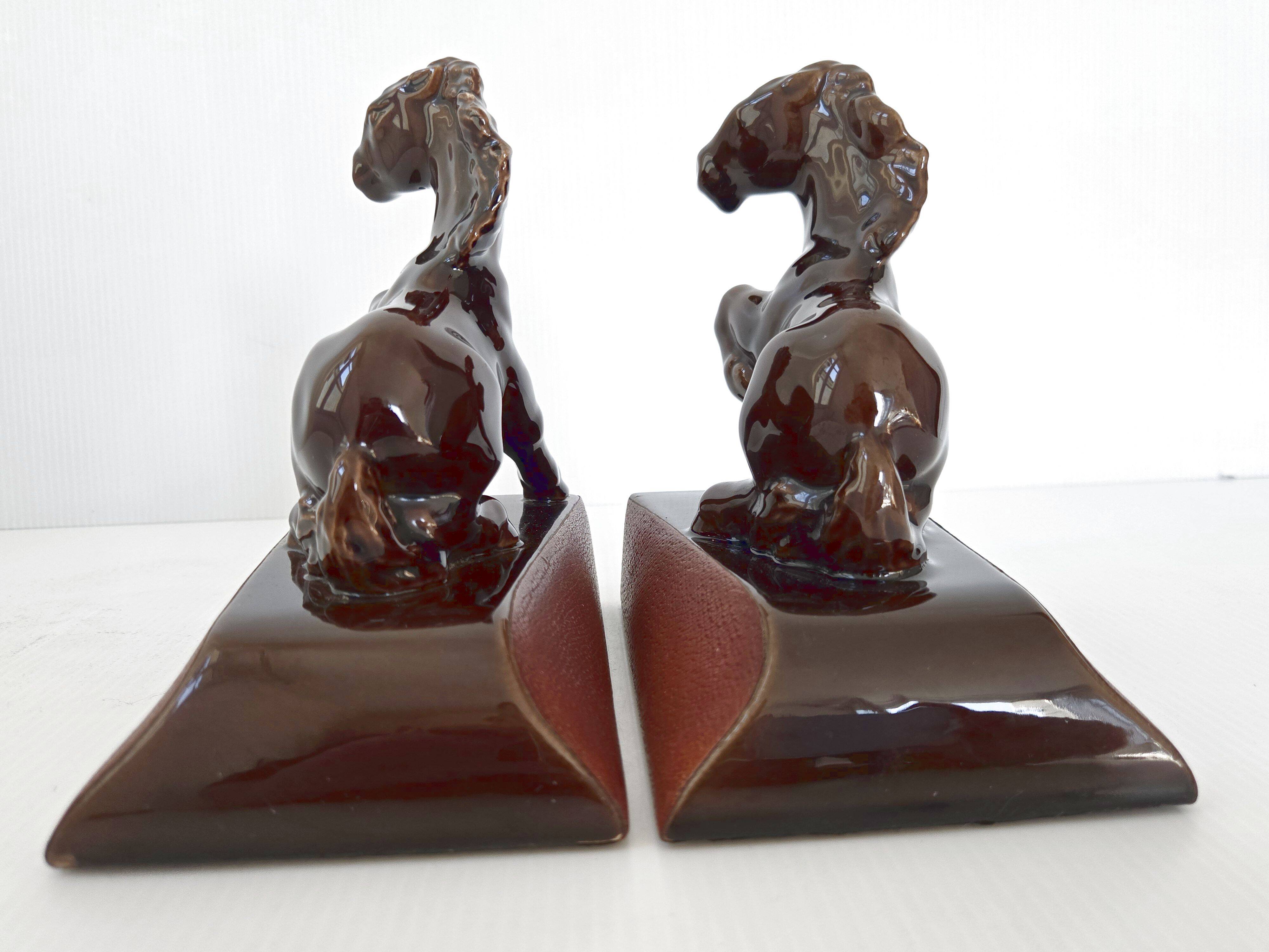 Pair of vintage leather & ceramic bookends