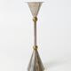 Pair of postmodern candlesticks in Memphis style made of steel and brass.