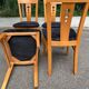 4 Scandinavian dining chairs in solid wood and black fabric from the 1990s.