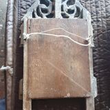 Old mirror in carved and gilded wood