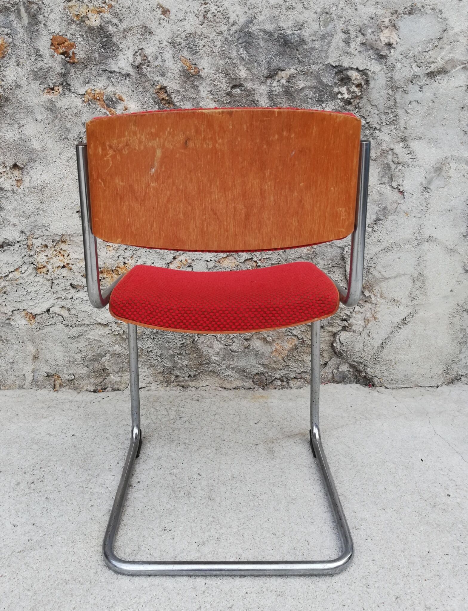 Red chairs cantilever chrome tubes