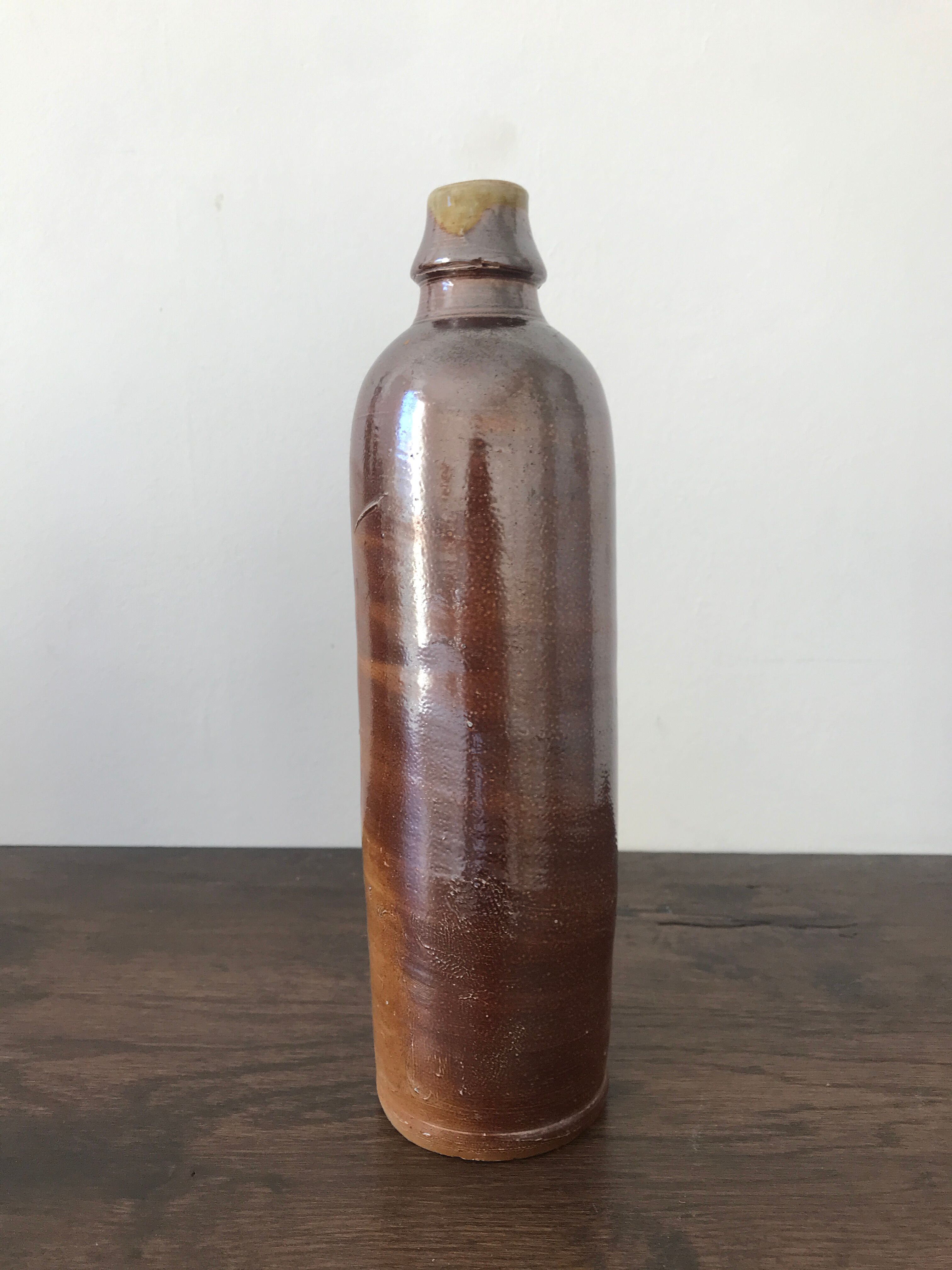 Pair of sandstone bottles