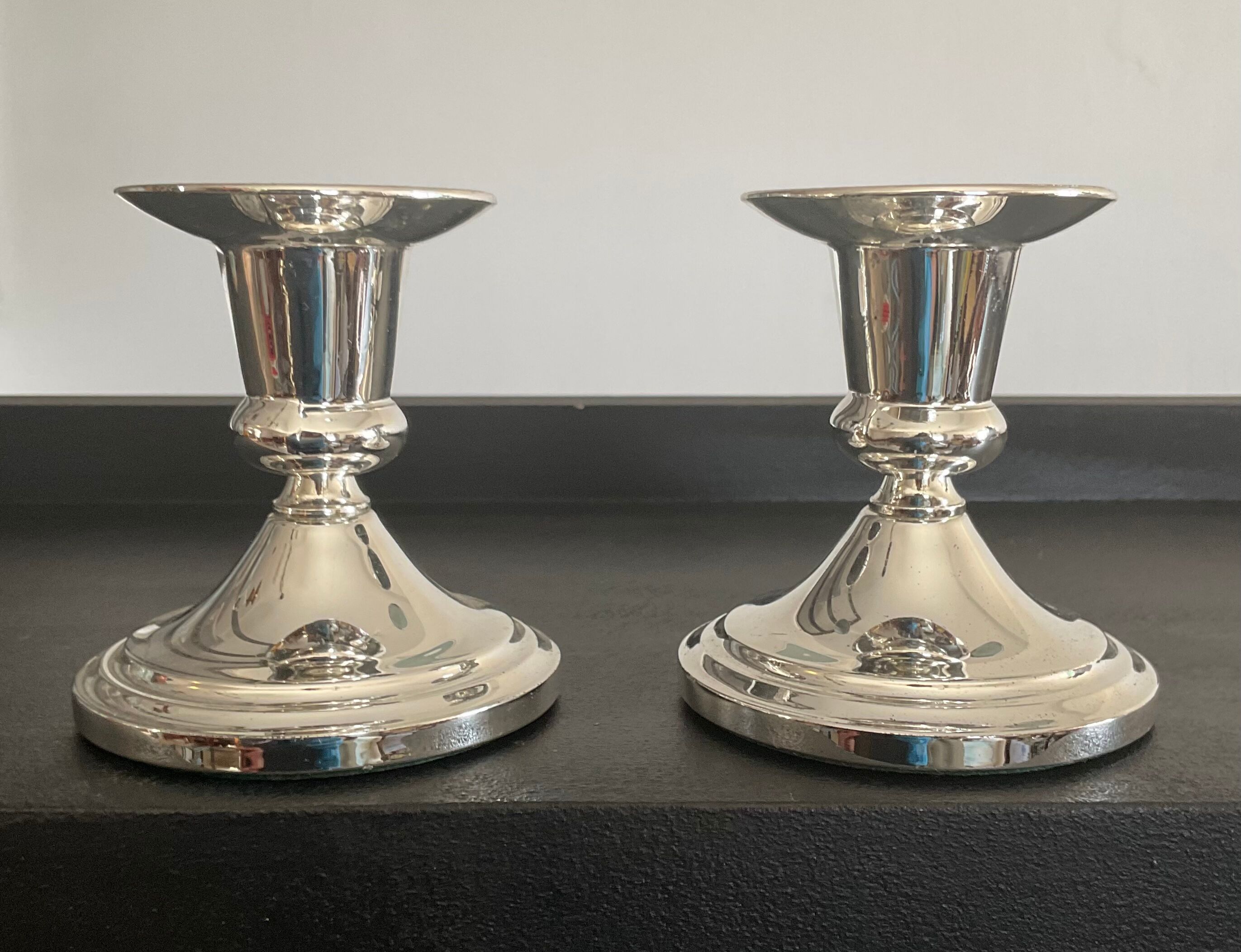 Pair of vintage candle holders in silver metal