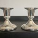 Pair of vintage candle holders in silver metal