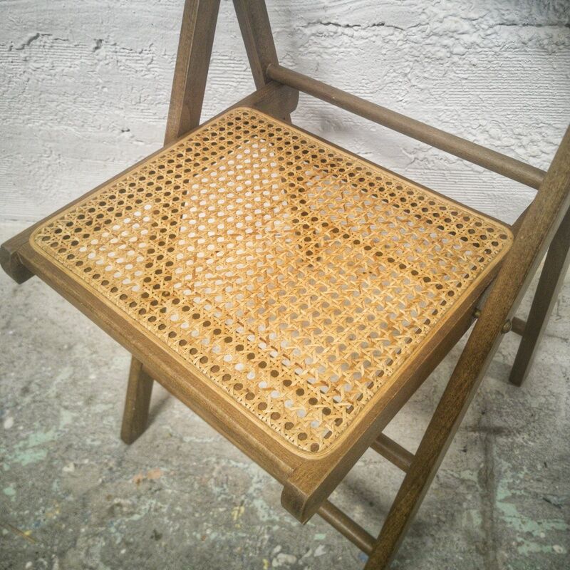 Folding chair with canned seat