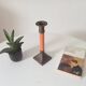 Vintage candlestick in solid gilded brass and orange wood.