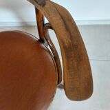 Thonet armchair, swivel, in wood and faux leather.